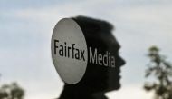 A man leaves the Fairfax Media headquarters in Sydney August 23, 2012. Reuters/Daniel Munoz 