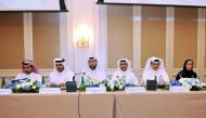 Abdulrahman Ahmad Al Shaibi (third left), Chairman of Qamco; and Ahmed Saeed Al Amodi (third right), Vice-Chairman, along with other board members at Qamco’s first General Assembly meeting in Doha yesterday. Pic: Abdul Basit / The Peninsula 
