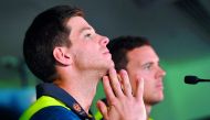 Australian cricket captain Tim Paine (L) and vice-captain Josh Hazlewood (R) listening to a quetion during a press conference in Melbourne on October 29, 2018. AFP / William West