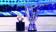 The AFC Asian Cup trophy and the official ball, on display  at the beIN SPORT studio complex yesterday. 