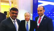 Qatar Motor and Motorcycle Federation (QMMF) President Abdulrahman Al Mannai (left) and QMMF Secretary General Abdul Razzaq Al Kuwari (right) pose for a photograph with FIA President Jean Todt during the FIA Council Meeting held in Saint Petersburg, Russi