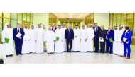 The Qatar International Center for Conciliation and Arbitration officials and the interns during the concluding session of the intership program.