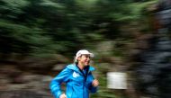 In this picture taken on December 8, 2018, Australian marathon runner Mina Guli runs on the track at the Peak in Hong Kong. AFP / Philip FONG 