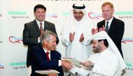 The Officials of Qatar Power company and Siemens during the signing ceremony.