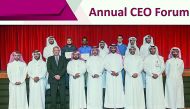 Qatargas National graduates and trainees posing for a picture with the senior management of the company at the CEO Forum 2018.