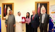 Sheikh Nasser bin Ali bin Saud Al Thani (second left), Chairman and Managing Director of Qatar General Insurance and Reinsurance Company (QGIRC), honouring the Acting CFO of QGIRC, Deepa Chandrashekar, on her receiving a doctorate degree in Islamic Financ