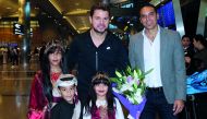 Alami poses for a photograph with Switzerland’s Stan Wawrinka (centre) who also arrived in Doha yesterday. 