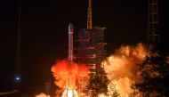 FILE PHOTO: This file picture taken early on December 8, 2018 shows a Long March 3B rocket, transporting the Chang'e-4 lunar rover, lifting off from the Xichang launch centre in Xichang in China's southwestern Sichuan province. AFP / STR
