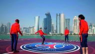 From left: PSG’s Kylian Mbappe, Neymar Jr, Thiago Silva and Edinson Cavani during a game on a floating football pitch at Doha Corniche in this December 2017 file photo.