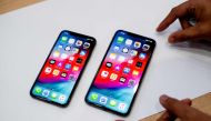 An Apple iPhone Xs Max and iPhone Xs rest on a table during a launch event on September 12, 2018 in Cupertino, California (AFP/Noah Berger) 