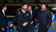 PSG goalkeeper Gianluigi Buffon checking into the team hotel upon arrival in Doha yesterday.