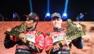 Qatari driver Nasser Saleh Al Attiyah (left) and co-driver Matthieu Baumel of France celebrate on the 2019 Dakar Rally podium in Lima, Peru, on Thursday. Al Attiyah cruised to his third Dakar Rally title with a 46-minute cushion over second-placed Nani Ro
