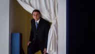 Brazilian President Jair Bolsonaro enters the stage prior to deliver a speech during the World Economic Forum (WEF) annual meeting, on January 22, 2019 in Davos, eastern Switzerland. AFP / Fabrice Coffrini 