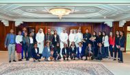 Dr Abdulbasit Ahmad Al Shaibei (centre), QIIB’s CEO, and other officials posing for a group picture with the Ethiopian students, accompanying teachers and their fellow Qatari students who invited them to the THIMUN Conference, held in Doha, recently.