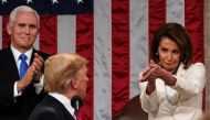 US President Donald Trump arrives to deliver the State of the Union address, alongside Speaker of the House Nancy Pelosi and Vice President Mike Pence,at the US Capitol in Washington, DC, on February 5, 2019. / AFP / pool / Doug Mills 