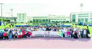 Qatargas management team, employees and family members, celebrating the National Sport Day in Aspire Zone, yesterday. 