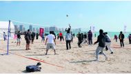The members of the community playing beach volleyball, one of the number of sporting events organised by the Ministry of Commerce and Industry (MoCI), in cooperation with the Economic Zones Company (Manateq), to mark the National Sport Day, at Katara, yes