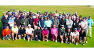 The golfers, who took part in the National Sport Day event at the Education City Golf Club on Tuesday, pose for a group picture.