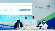H E Saad bin Sherida Al Kaabi, Minister of Energy Affairs, and Maen Razouqi, NME Geomarket Manager Schlumberger, witness the signing of the MoU by Khalid Al Rumaihi, Executive V-P Subsurface Development & Exploration Qatar Petroleum, and Amit Singh, Manag