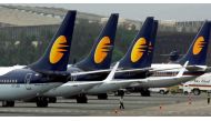 Jet Airways aircraft stand on tarmac at the domestic airport terminal in Mumbai, India, September 9, 2009. Reuters/Punit Paranjpe