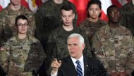 US Vice President Mike Pence delivers a speech at the 1st Airlift Base in Warsaw on February 13, 2019 during a three-day visit of the US Vice President to Poland. AFP/Janek Skarzynski