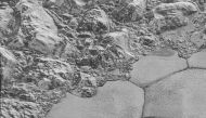Pluto's dune formations can be seen in the bottom half of the picture. Picture: NASA - Johns Hopkins University APL - Southwest Research Institute.

