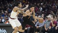 Phoenix Suns guard Devin Booker (1) drives to the basket against Cleveland Cavaliers guard Jordan Clarkson (8) during the first half at Quicken Loans Arena Feb 21, 2019; Cleveland.  Credit: Ken Blaze-USA TODAY Sports