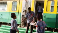 Staff members of Ghana's railway system ready to board passengers on the train reconnecting Accra to Tema, 25 kilometres east of the capital city on January 29, 2019. AFP / Ruth Mcdowall 
 