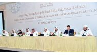 Sheikh Mohamed bin Hamad bin Jassim Al Thani, Chairman of the Board and Managing Director of Barwa Bank, and other board members at the AGM, yesterday. 