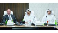 Dr Jabor Fadl Al Nuaimi (centre), presiding over the meeting on behalf of the Chairman of the Committee Mohamed bin Ahmed bin Towar Al Kuwari, First Vice-Chairman of Qatar Chamber, at QC headquarters, yesterday. 
