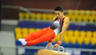 Qatari teenager Raslen Saoud in action in yesterday’s qualifying round of the pommel horse during the opening day of the FIG ART Individual Apparatus World Cup at Aspire Dome in Doha. 
PICTURES: WASFY