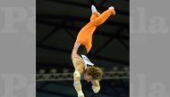 Dutch star Epke Zonderland in action in the qualifying round of horizontal bars at FIG ART Individual Apparatus World Cup in Doha, yesterday.    