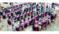 Participants at the Qatargas Chess Tournament are seen planning their next moves during the three-day events held at Al Mirqab Mall in Doha.