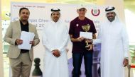 FROM RIGHT: Hamad Ali Al Awai, Acting PR Manager, Qatargas, Yann Guidez of France, Mohamed Al Mudahka, President of Qatar Chess Federation and Fahim Matabdin, Senior Marketing Manager for Al Mirqab Mall, in Doha yesterday.