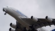 An Airbus A380 airplane performing at the International Paris Airshow in Le Bourget, north of Paris on June 18, 2015. AFP/Miguel Medina