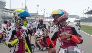 Saeed Al Sulaiti (right) and Abdulla Al Qubaisi before the start of a race at the Losail International Circuit in this file photo. 