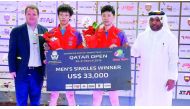 ITTF World Tour Platinum Qatar Open champion Ma Long (third left) and runner-up Lin Gaoyuan pose for a photograph with Khaleel Al Mohannadi (right), President of Qatar and Arab table tennis associations and International Table Tennis Federation CEO Steve 