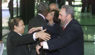 Cuban President Fidel Castro (R) greeting Algerian President Abdelaziz Bouteflika before the opening session of the Group of 77 South Summit, in Havana on April 12, 2000. AFP / Adalberto Roque 