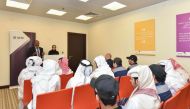 QNB officials briefing the visiting students on functions of the bank’s IT division.