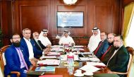 Sheikh Ali Abdullah Al Thani (centre), Chairman of Pak-Qatar Takaful Group,  Abdul Basit Ahmad Al Shaibei (fourth left); and other board members during the meeting.