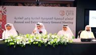 Abdulla bin Fahad bin Ghorab Al Marri, (centre) Chairman of QFB; Ibrahim Mohamed Ibrahim Jaidah, Board Member (right); and Ali Mohammed Al Obaidli (left) CEO of QFB during the AGM in Doha yesterday. Pic: Abdul Basit/the peninsula
