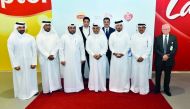 H E Ali bin Ahmed Al Kuwari (centre), Minister of Commerce and Industry; and other officials during the opening ceremony.