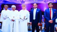 Adeeb Ahamed (second left), Managing Director, LuLu Exchange, with other dignitaries, witnessing the unveiling of the new brand name and logo in Muscat on Sunday. 