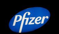 FILE PHOTO: The logo of U.S. pharmaceutical corporation Pfizer Inc. is seen at a branch in Zurich, Switzerland October 2, 2018. REUTERS/Arnd Wiegmann