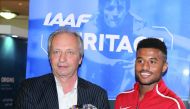 Diamond League CFO Petr Stastny and Qatar’s Youth Olympics Champion Owaab Barrow pose for a photograph with the Diamond Trophy.