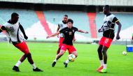 Al Duhail’s Japanese international player Shoya Nakajima passes the ball to team-mate Almoez Ali (right) during a training session held in Tehran, Iran, yesterday, ahead of today’s AFC Champions League Group C match against Esteghlal FC.  