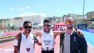 Qatari athletes Eid Al Bordani and Abdulaziz Al Ali seen along with Triathlon Federation coach Mat O’Halloran druing the ITU Multisport World Championships, in Pontevedra, Spain.