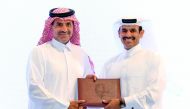 H E Saad bin Sherida Al Kaabi (right), the Minister of State for Energy Affairs, the President & CEO of QP, presents the Qatarization Certificate to Sheikh Khalid bin Khalifa Al Thani, CEO of Qatargas.