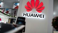 A Huawei logo is displayed at a retail store in Beijing on May 20, 2019. US internet giant Google, whose Android mobile operating system powers most of the world's smartphones, said it was beginning to cut ties with China's Huawei, which Washington consid