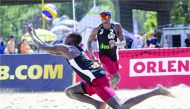 Qatar’s Cherif Younousse and Ahmed Tijan in action against USA’s Trevor Crabb and Tri Bourne during their second Pool G match at the FIVB Beach Volleyball World Tour, Warsaw event in Poland, yesterday.
